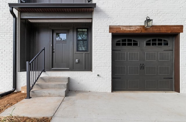 property entrance featuring a garage