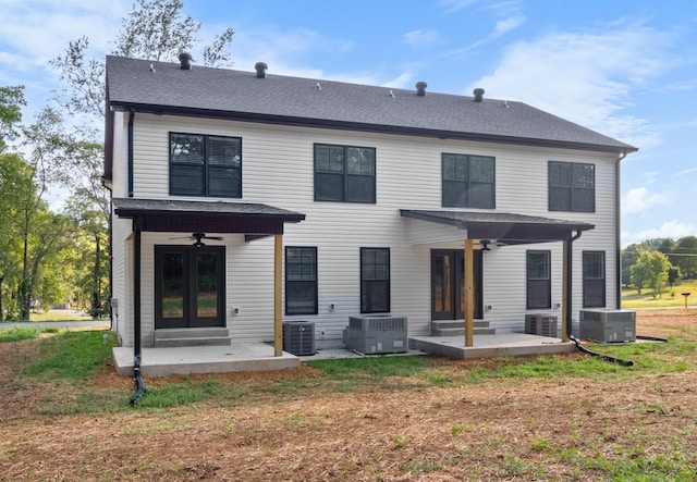 rear view of house featuring cooling unit and a patio