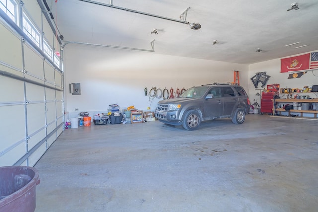 garage featuring a garage door opener