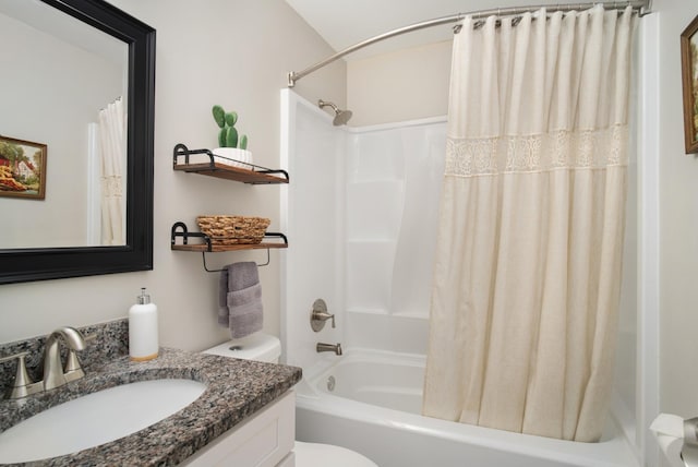 full bathroom featuring shower / bathtub combination with curtain, vanity, and toilet