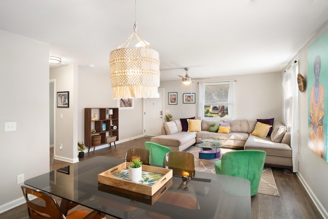 living room with dark hardwood / wood-style floors and ceiling fan