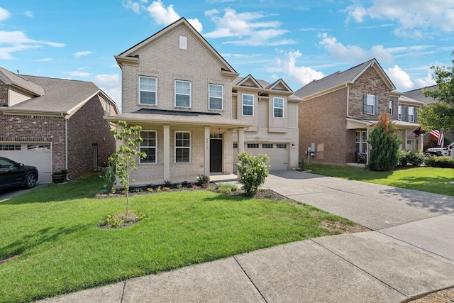 view of front of house with a garage and a front yard