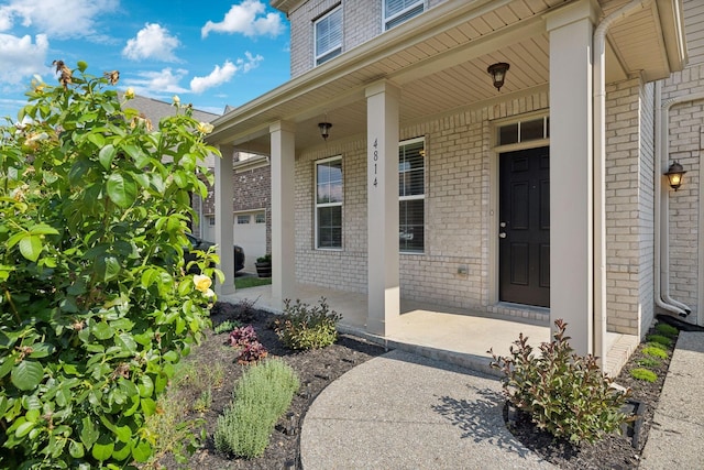 property entrance with a porch