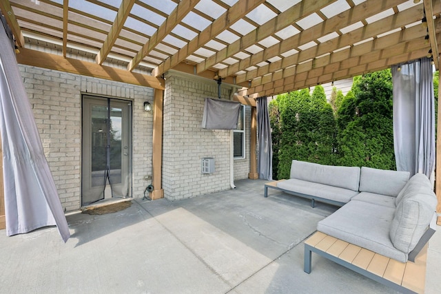 view of patio with an outdoor living space and a pergola