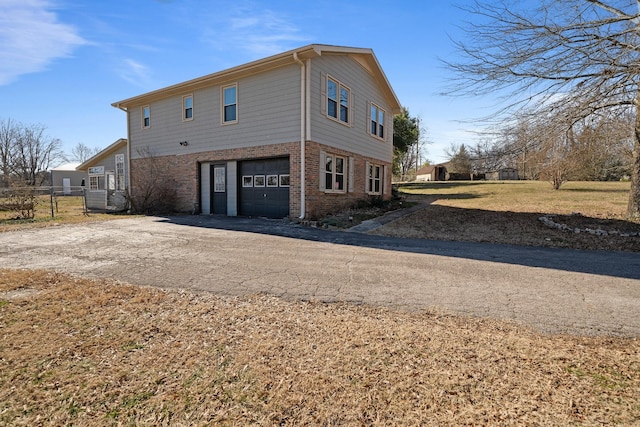 view of property exterior featuring a garage