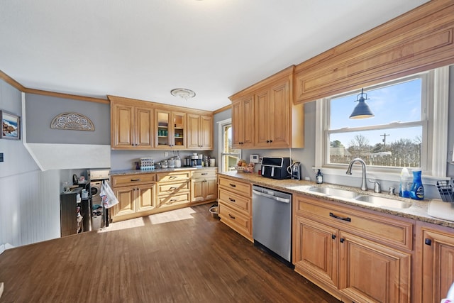 kitchen featuring pendant lighting, crown molding, dishwasher, and sink