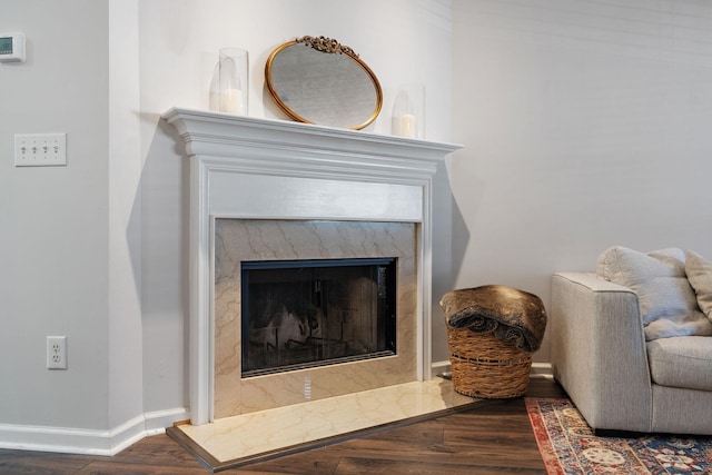 interior space featuring hardwood / wood-style flooring and a fireplace