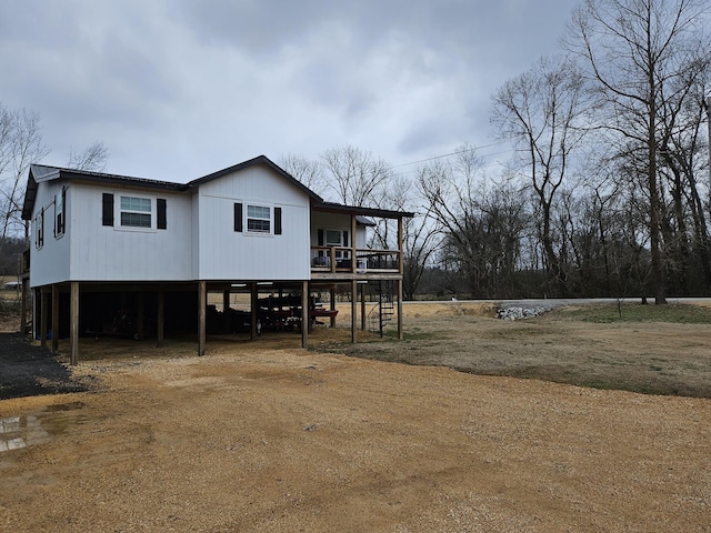 exterior space with a carport