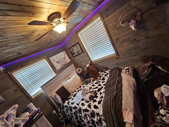 unfurnished bedroom featuring ceiling fan and wooden ceiling