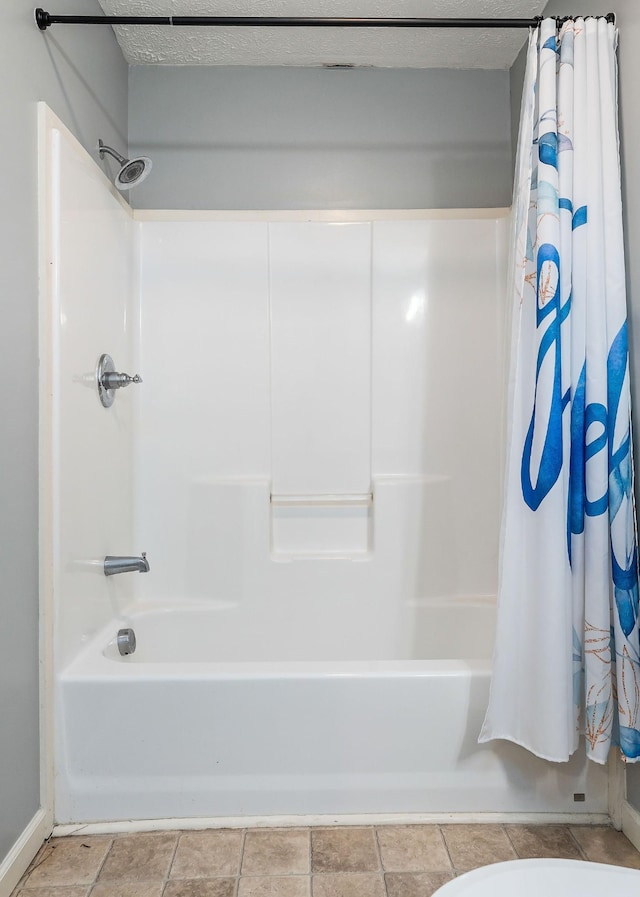 bathroom featuring shower / bath combination with curtain