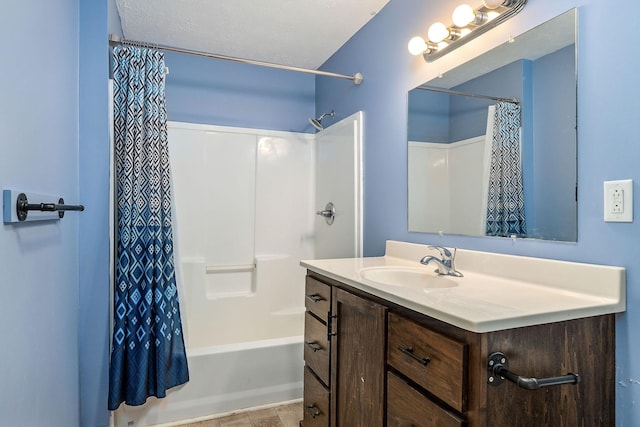 bathroom featuring vanity and shower / bath combo with shower curtain