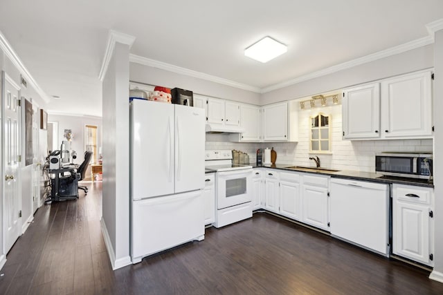 kitchen featuring sink, white appliances, dark wood-type flooring, tasteful backsplash, and white cabinets