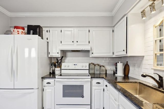 kitchen featuring sink, crown molding, dark stone countertops, white appliances, and white cabinets