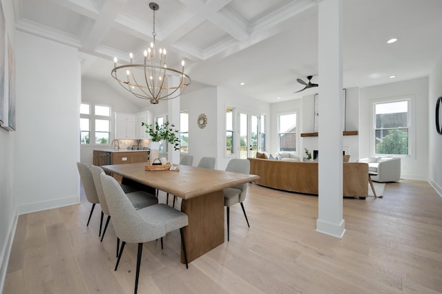 dining room with coffered ceiling, beam ceiling, light hardwood / wood-style flooring, and ceiling fan