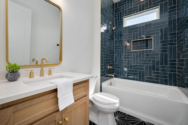 full bathroom featuring vanity, toilet, and tiled shower / bath combo