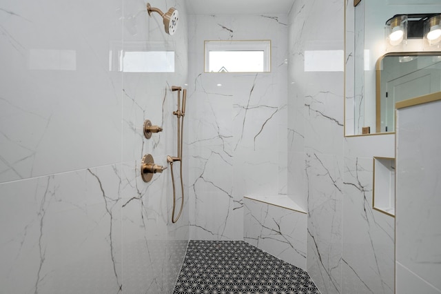 bathroom featuring tiled shower