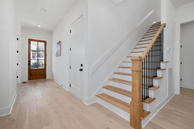 entrance foyer with light wood-type flooring