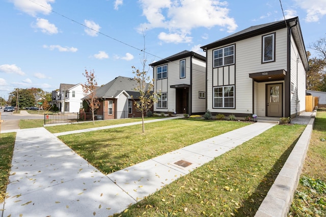 view of front of home featuring a front lawn