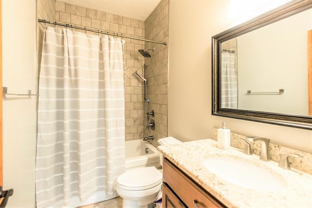 full bathroom featuring shower / tub combo with curtain, vanity, and toilet