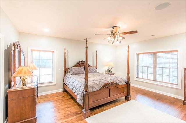 bedroom featuring ceiling fan and light wood-type flooring