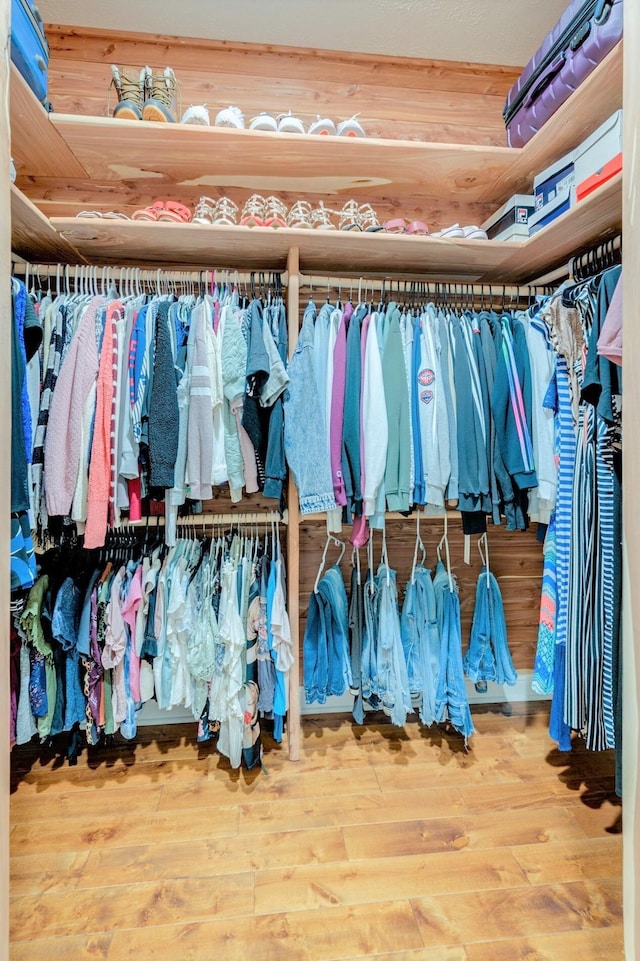 walk in closet featuring hardwood / wood-style floors