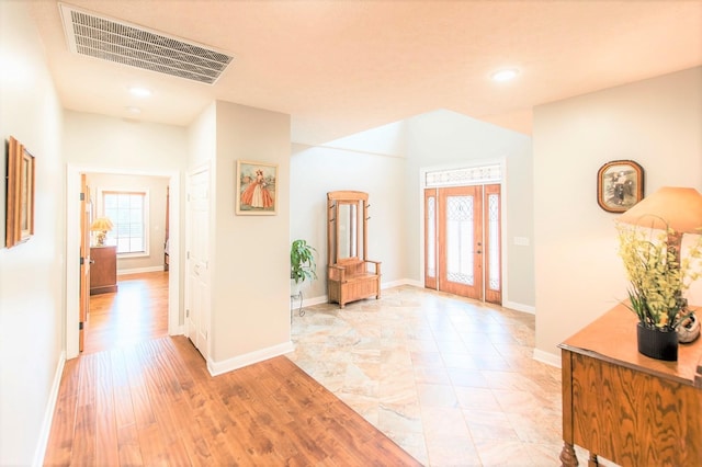 foyer entrance featuring light wood-type flooring