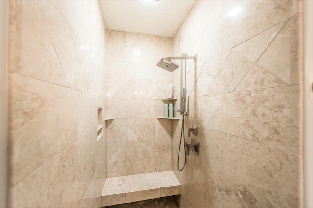 bathroom featuring tiled shower