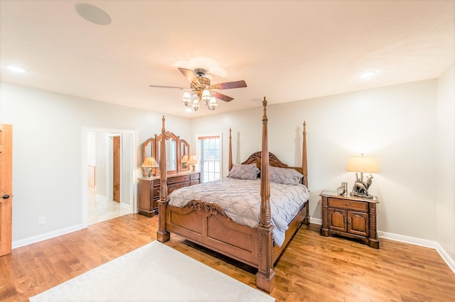 bedroom featuring ceiling fan and light hardwood / wood-style flooring