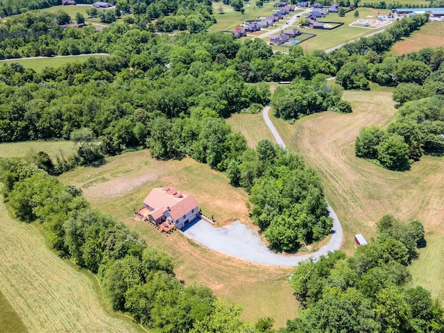 birds eye view of property featuring a rural view