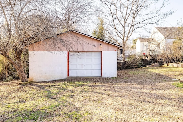 garage with a lawn