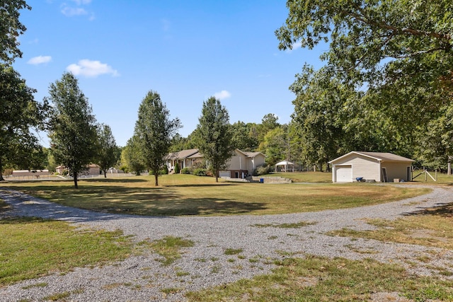 view of yard featuring a garage