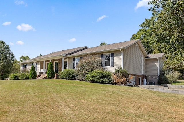 ranch-style home with a front yard