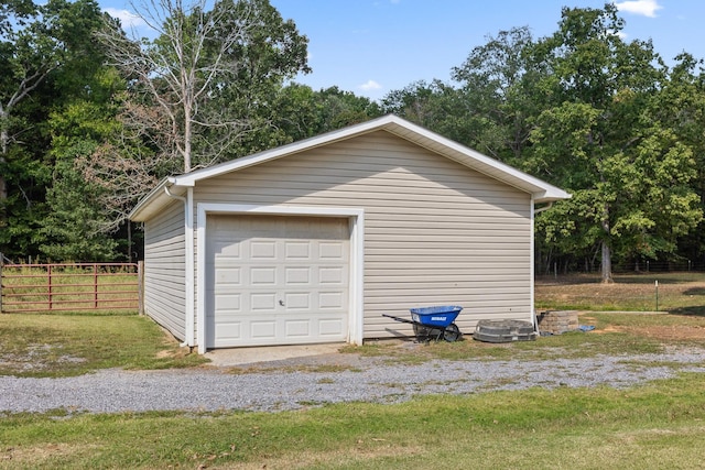 garage with a lawn