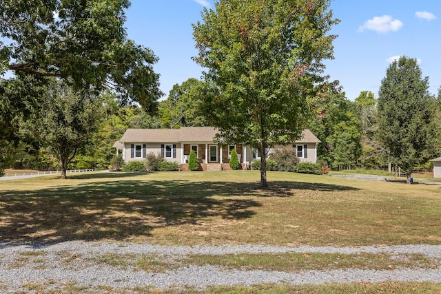 ranch-style house with a front lawn