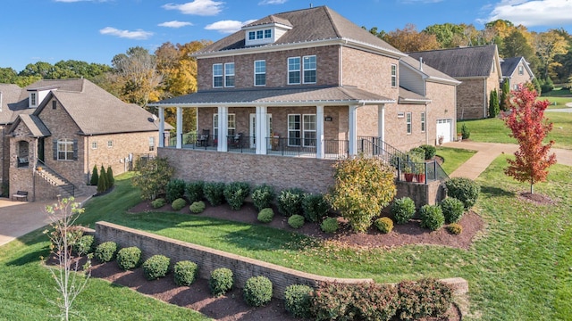 view of front of house featuring a porch and a front lawn