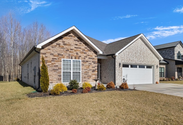 view of front of home featuring a garage and a front lawn