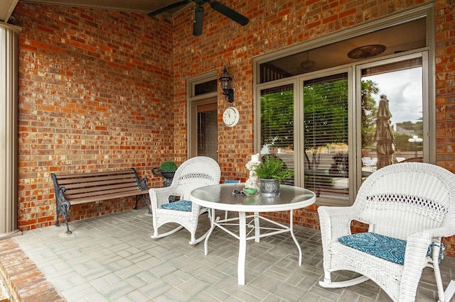 view of patio featuring ceiling fan