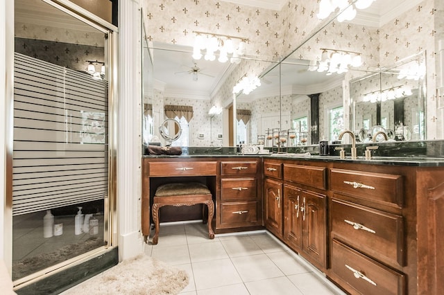 bathroom with tile patterned flooring, vanity, ornamental molding, and ceiling fan