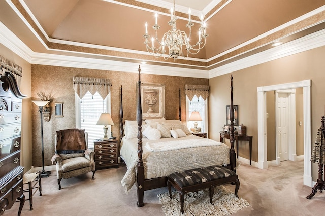 bedroom featuring crown molding, carpet floors, a chandelier, and a tray ceiling