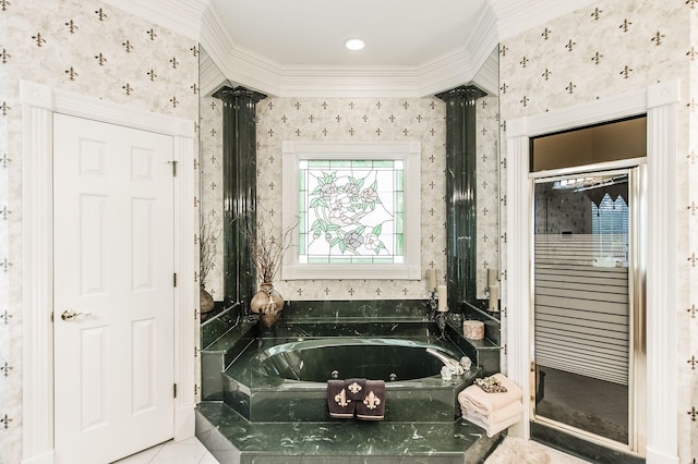 bathroom featuring ornate columns, ornamental molding, tile patterned flooring, and tiled bath