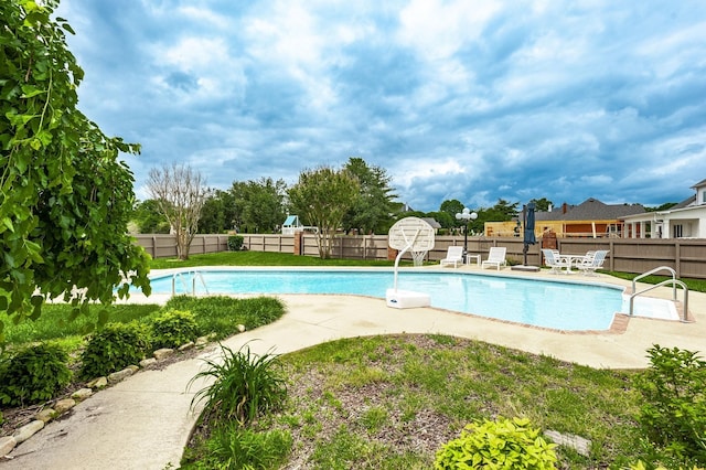 view of pool featuring a patio area