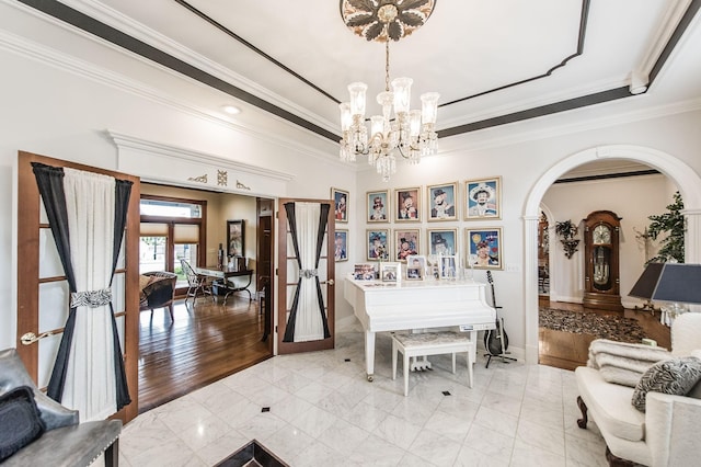 dining room with an inviting chandelier and crown molding