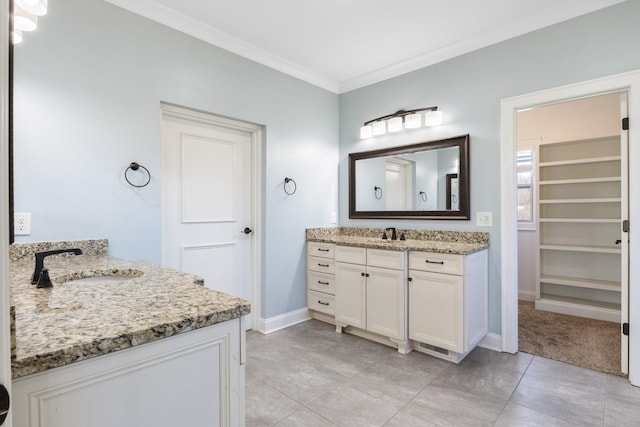 bathroom with vanity, tile patterned flooring, and ornamental molding