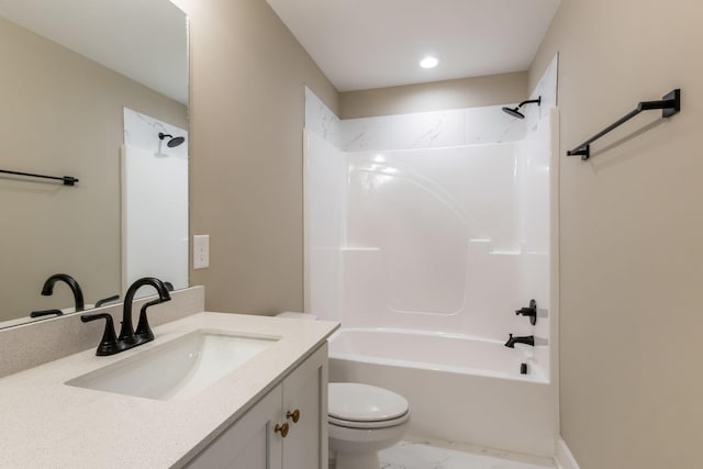 bathroom with shower / bathing tub combination, toilet, marble finish floor, and vanity