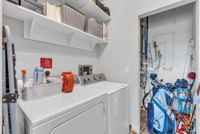 clothes washing area featuring washing machine and dryer