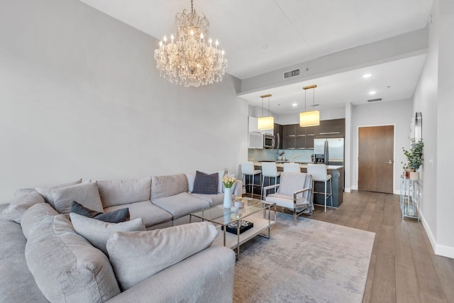 living room with light hardwood / wood-style floors