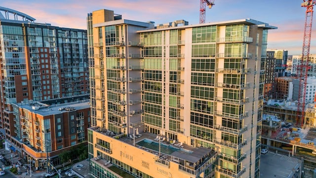 view of outdoor building at dusk