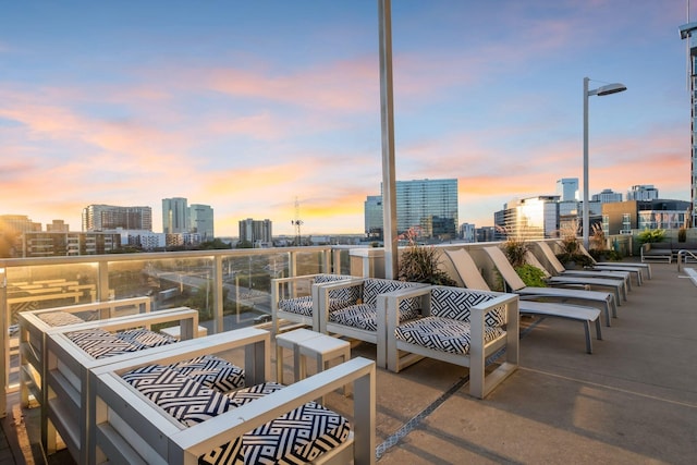 view of patio terrace at dusk