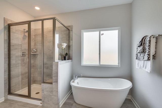 bathroom with independent shower and bath