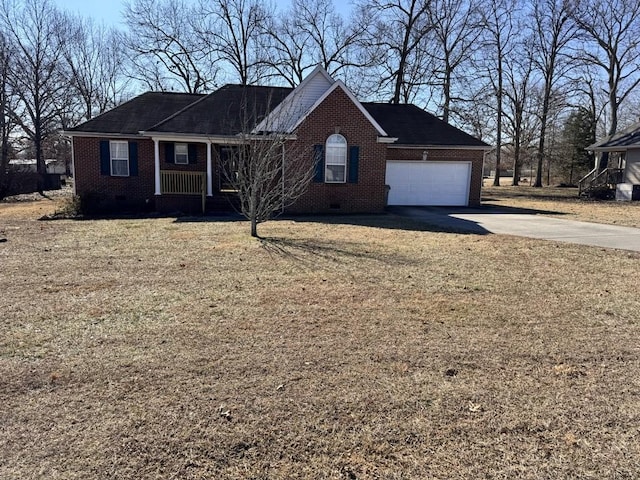 view of front of property featuring a garage and a front yard